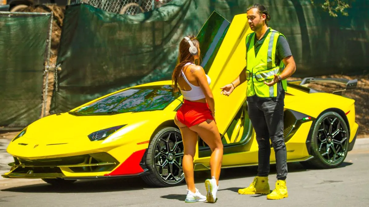 Man Picking up Lady in Yellow Lamborghini