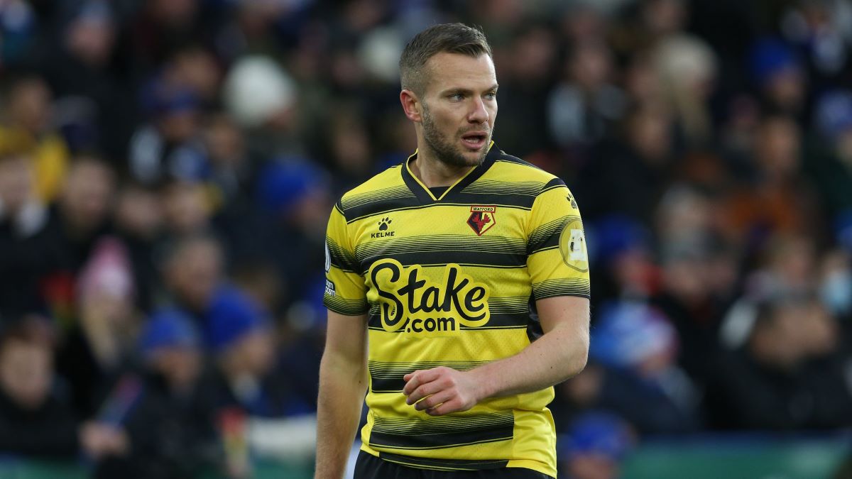 Stakes branding on the Watford FC jersey