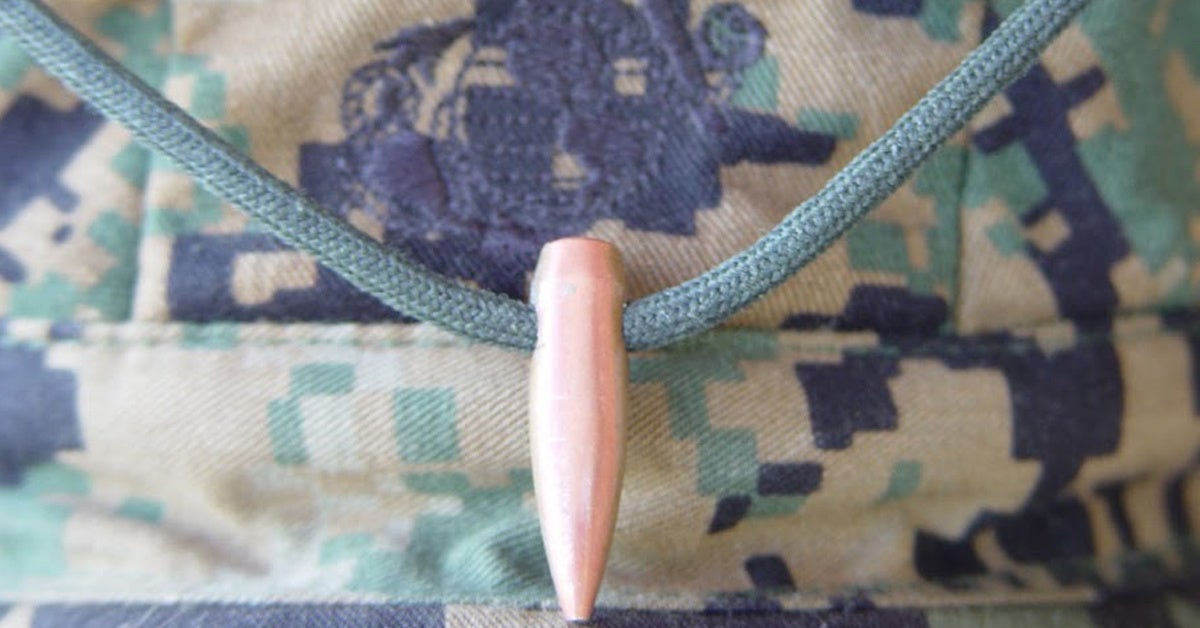 Hogs Tooth worn around the neck of a US Marine sniper