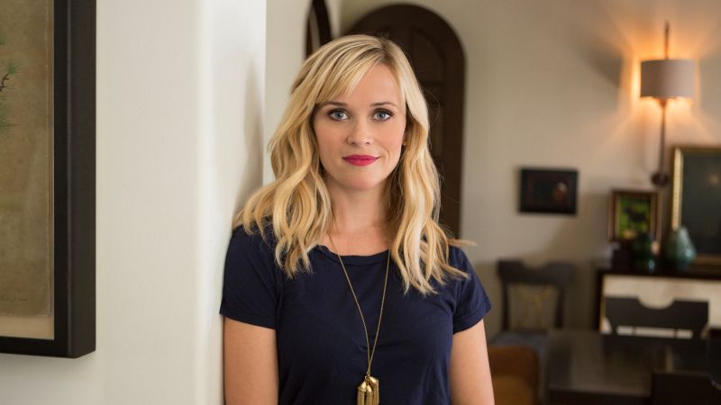 reese witherspoon standing inside her LA home.
