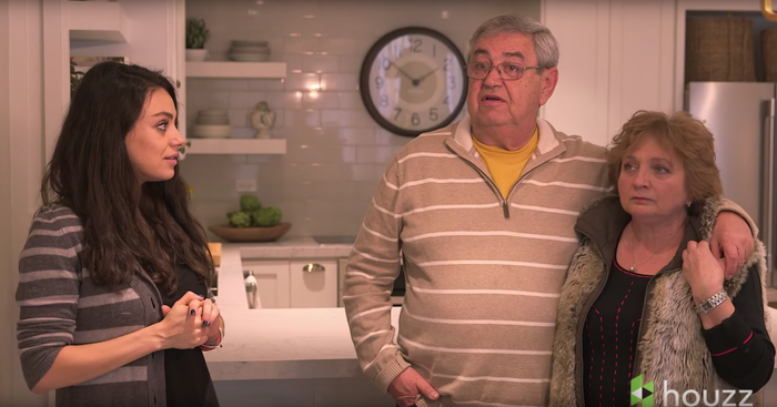 Mila kunis pictured with her parents in her newly renovated childhood home.