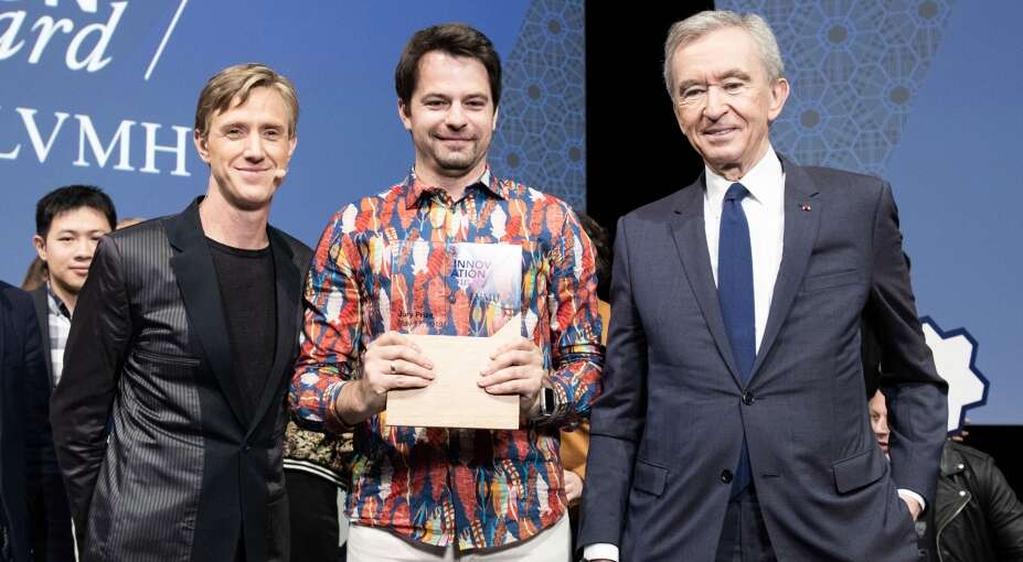 Bernard Arnualt presenting the LVMH innovation award to the winner of the Viva technology show competition in 2019.