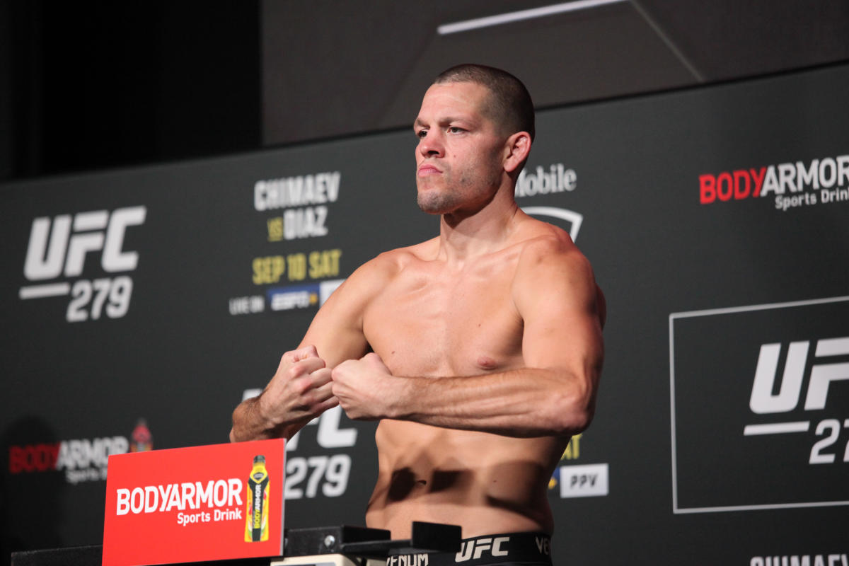Nate Diaz poses for camera at MMA event